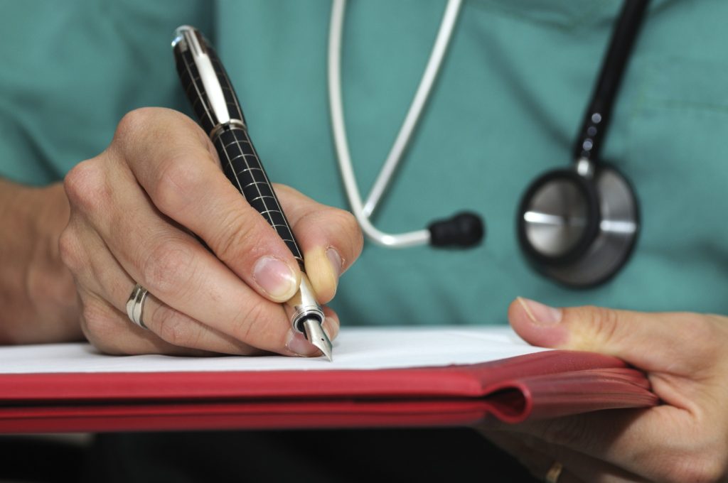 Doctor writing