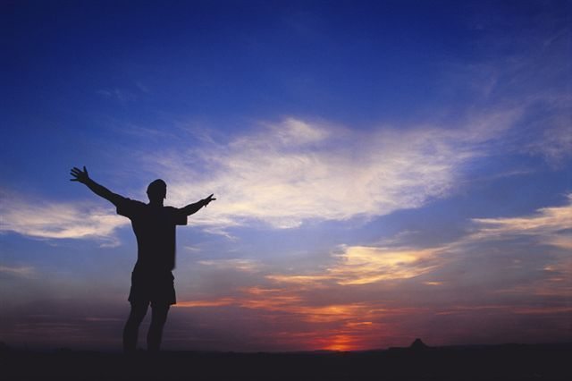 Man with arms wide open