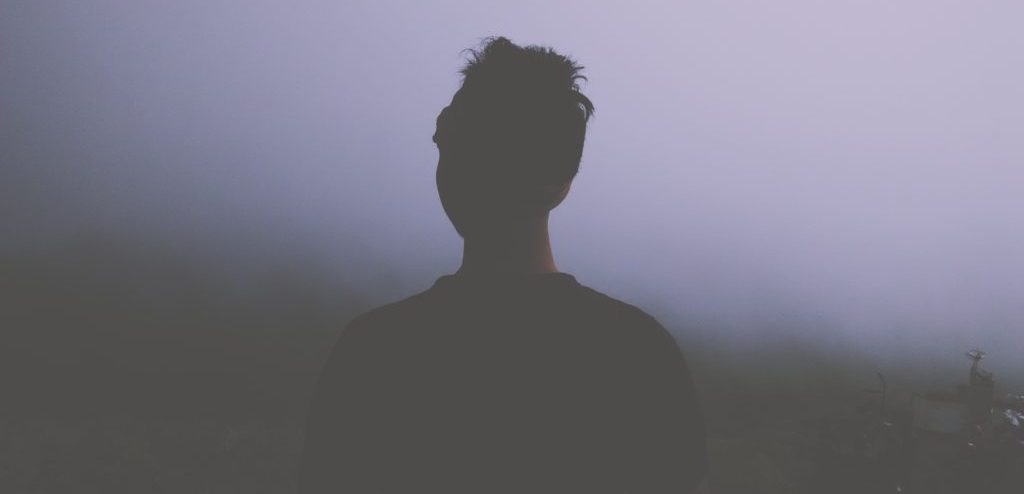 Silhouette of person on a gloomy day