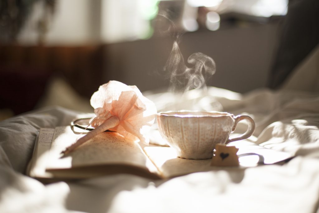 Cup of tea and pen on a diary