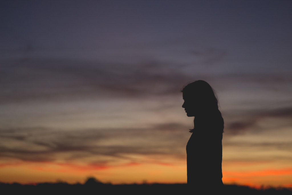 Silhouette woman outside
