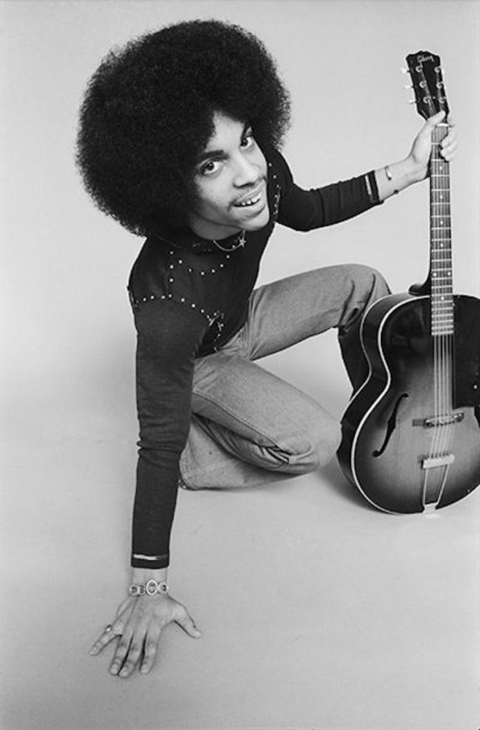 Prince posing with guitar