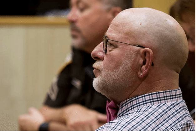 Marty Huckins, a counselor with Personal Frontiers, listens to clients speak during a session of the Adult Treatment Court on Sept. 27, 2016, at the Campbell County Courthouse in Gillette, Wyo. The Adult Treatment Court program contracts with Personal Frontiers to provide the counseling to those involved in the court-ordered recovery program. Gillette News Record via AP Steel Brooks