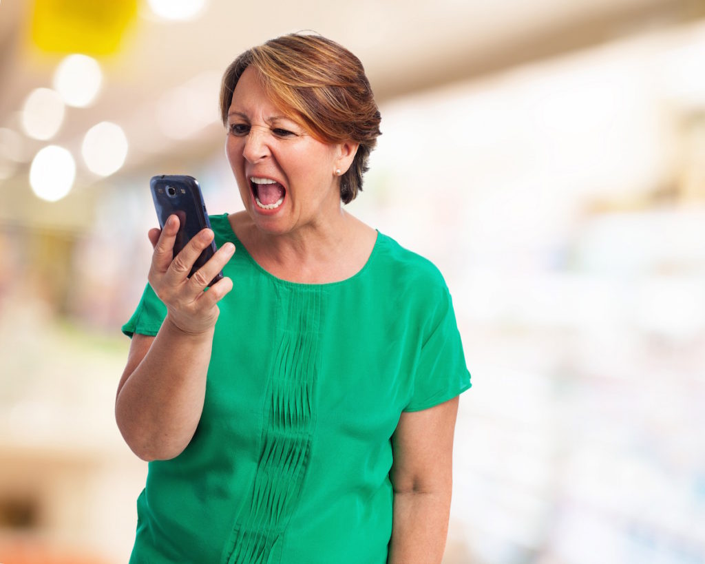 Woman yelling into phone