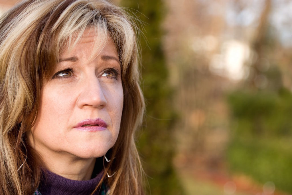 Woman looking sad