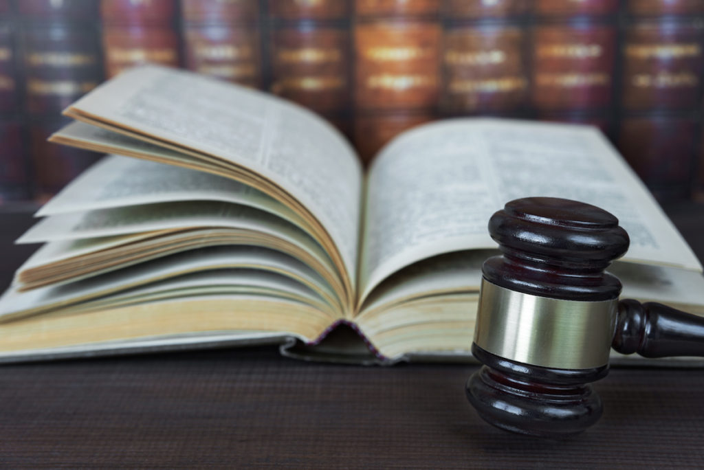 Law book and judge mallet