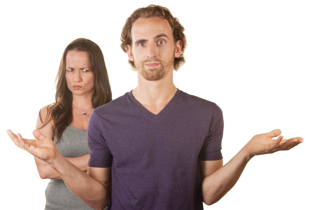 Confused man and upset woman