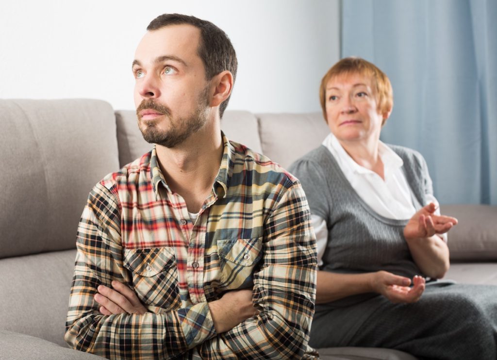 Man looking away from woman