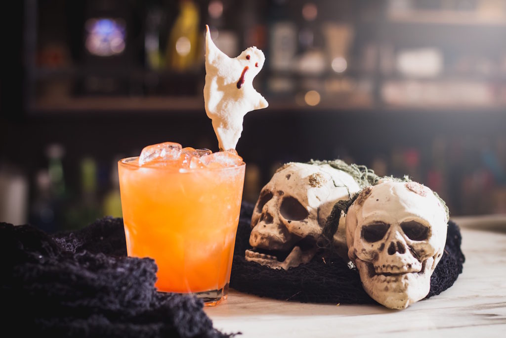 Orange drink and Halloween decorations