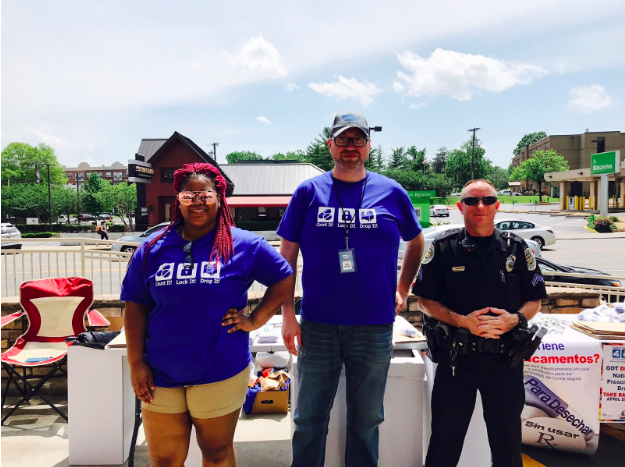 police officer standing with donation drive