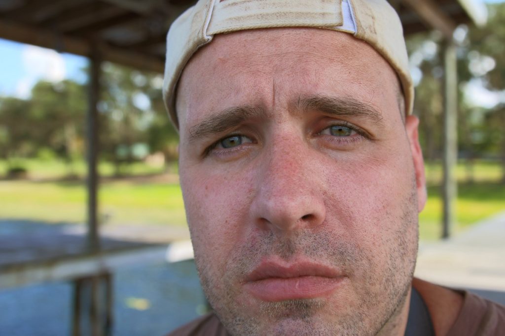 Close up of man looking sad