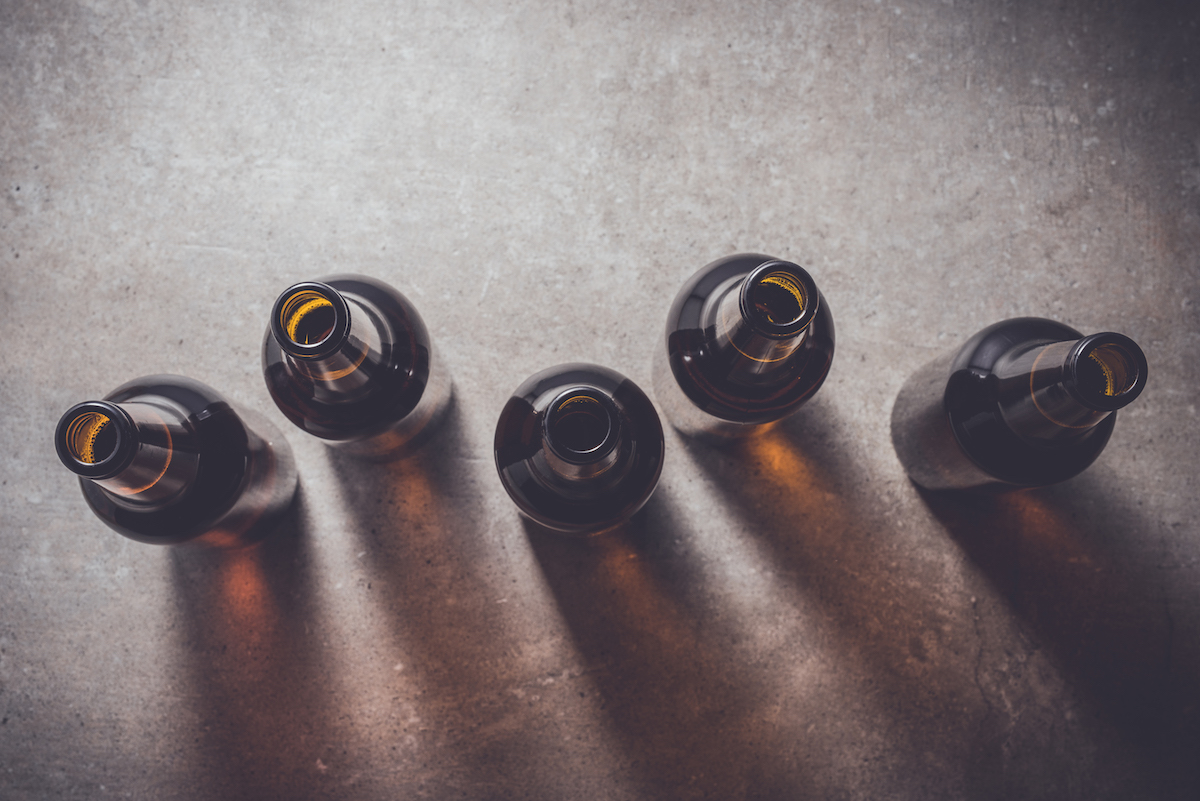 empty beer bottles lined up