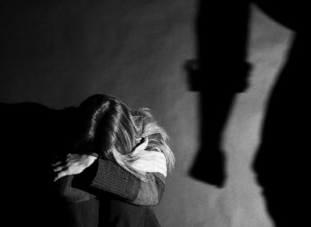 Upset woman with head down