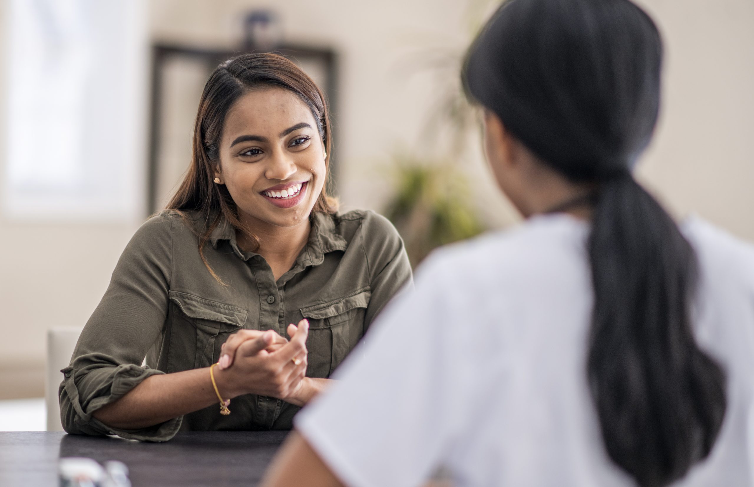 Woman speaking to health counselor