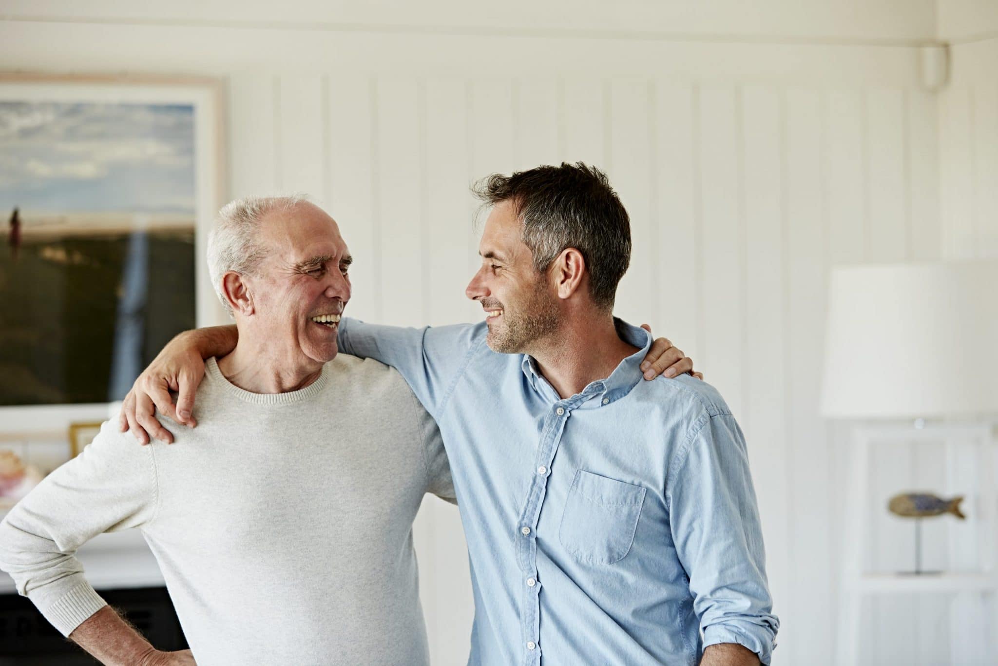 Smiling father and son