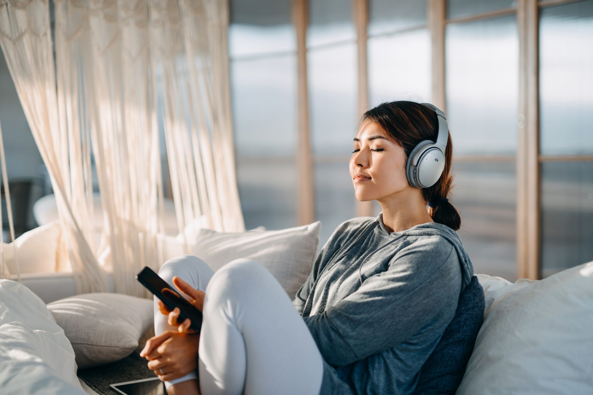 lady listening to music with headphones