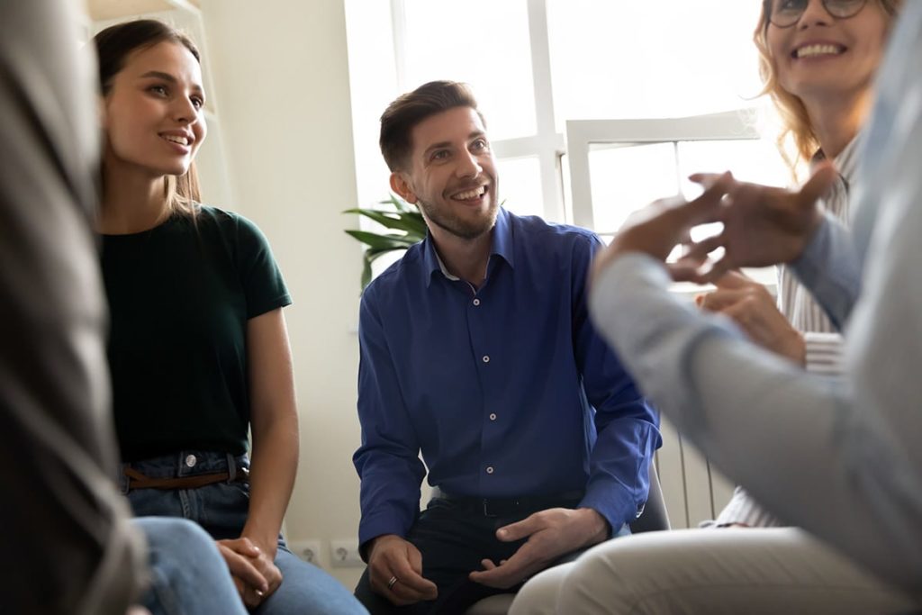 people experiencing the benefits of group therapy